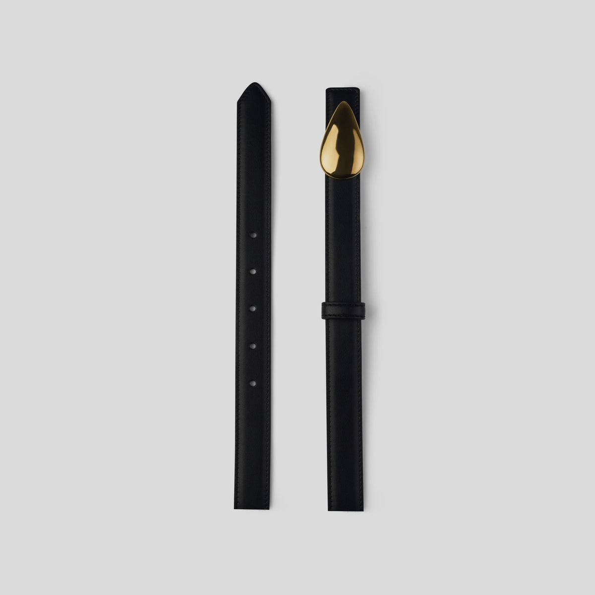 THE ZUR black belt with sculptural gold-tone buckle — detail view