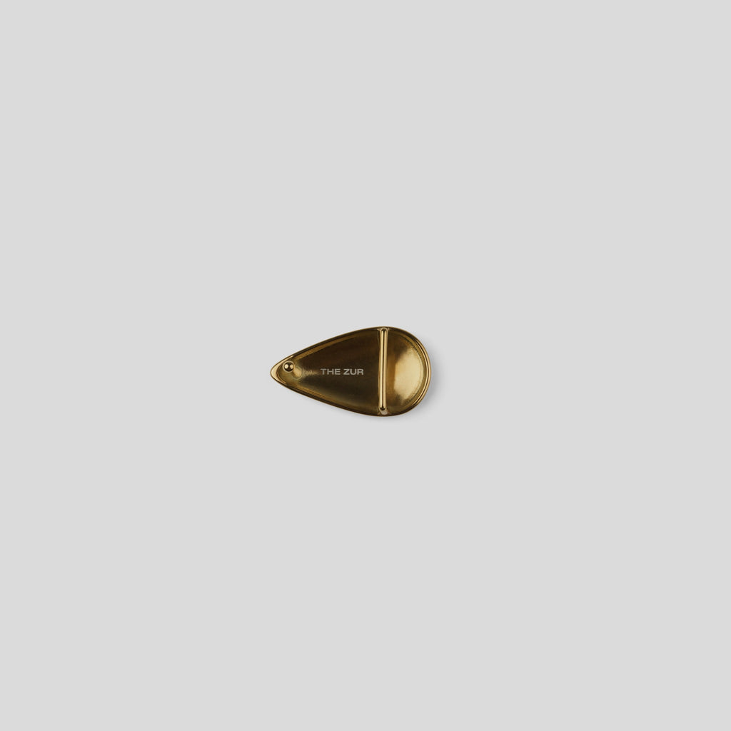 THE ZUR brown belt with sculptural gold-tone buckle — detail view