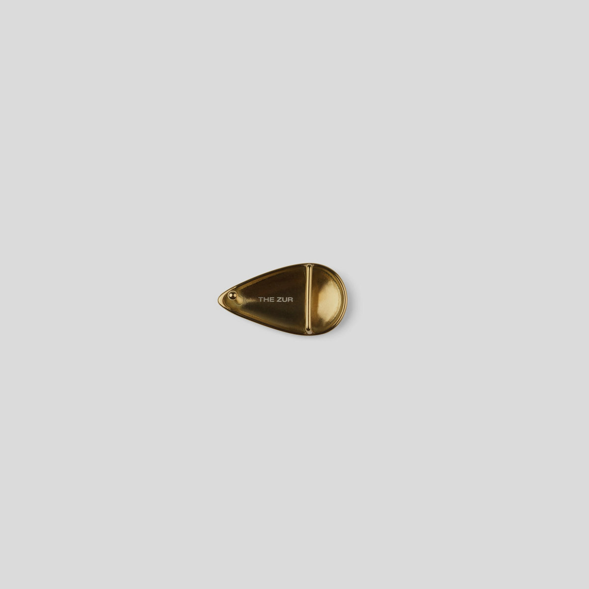 THE ZUR brown belt with sculptural gold-tone buckle — detail view